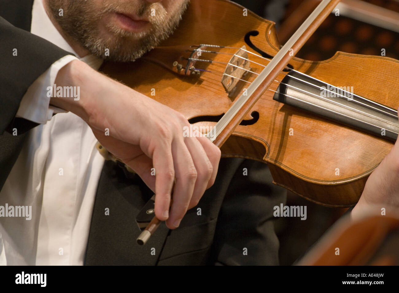 Classic Music Orchestra violinist playing a violin Stock Photo