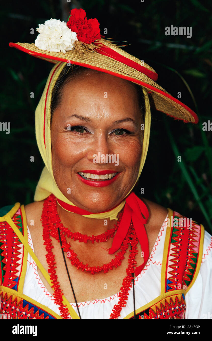 Portrait of a woman wearing traditional dress during Corpus Christi