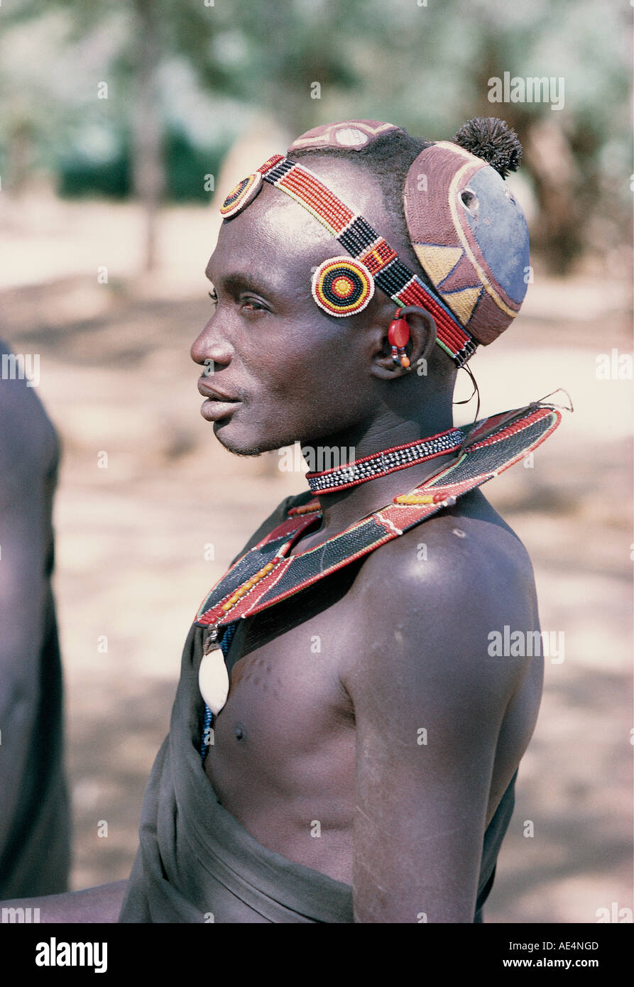 Profile of a young but mature Pokot man wearing traditional dress Near Sigor northern Kenya East Africa Stock Photo