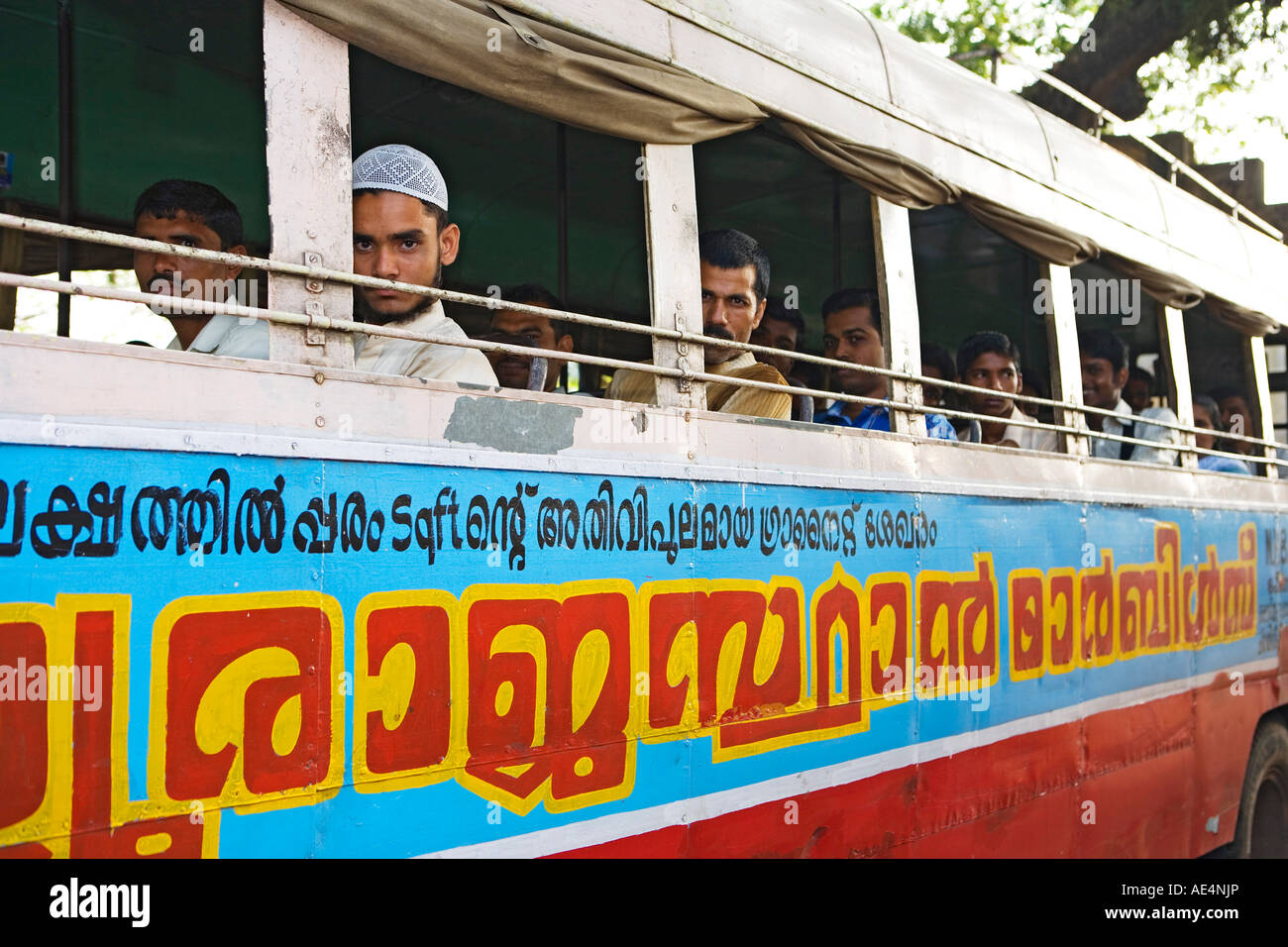 INDIA KERALA ALLEPPEY MEN ON BUS Stock Photo - Alamy
