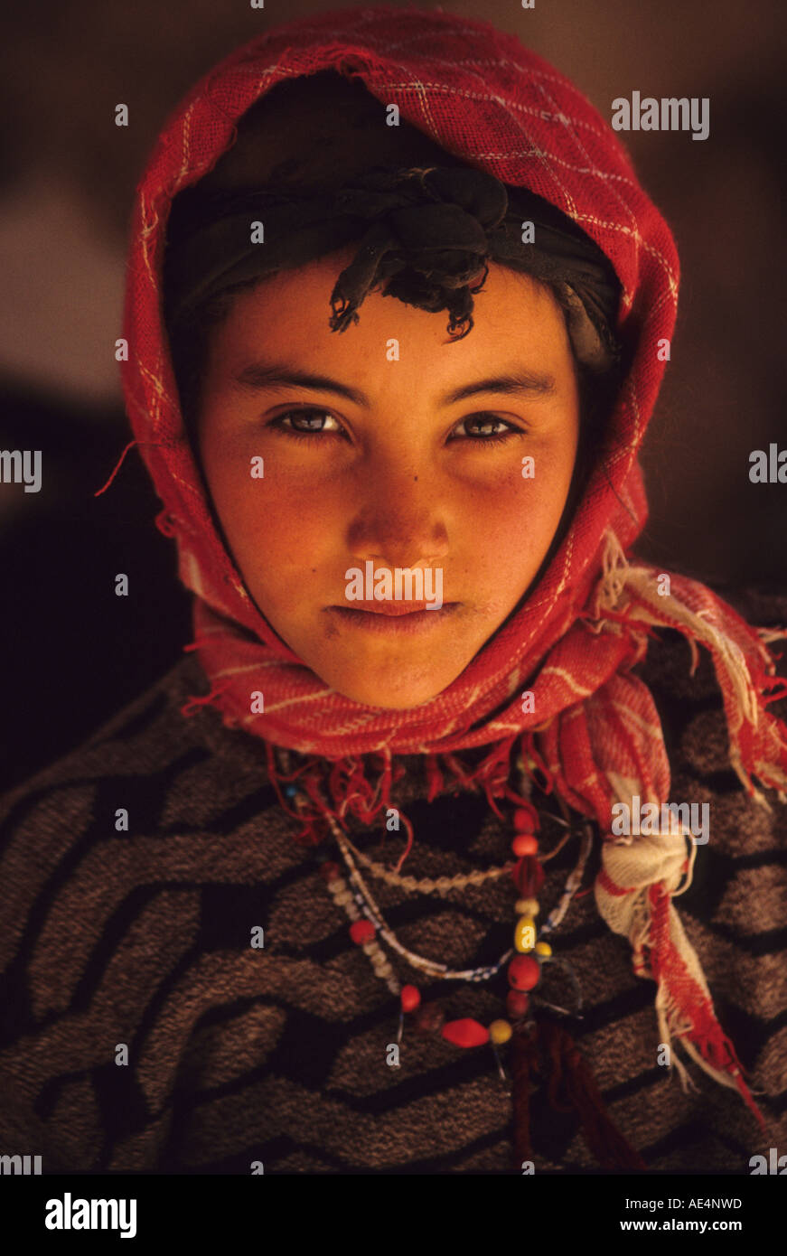 Todra Morocco. Berber Girl with Necklaces and Headscarf Stock