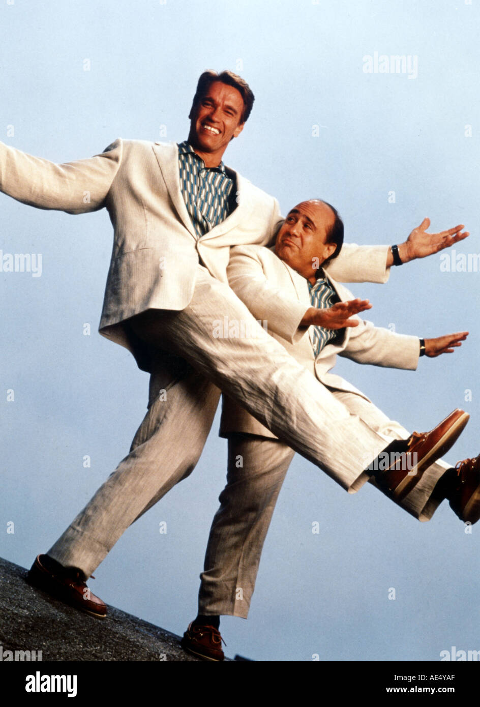 TWINS Arnold Schwarzenegger and Danny DeVito in the 1988 film Stock Photo
