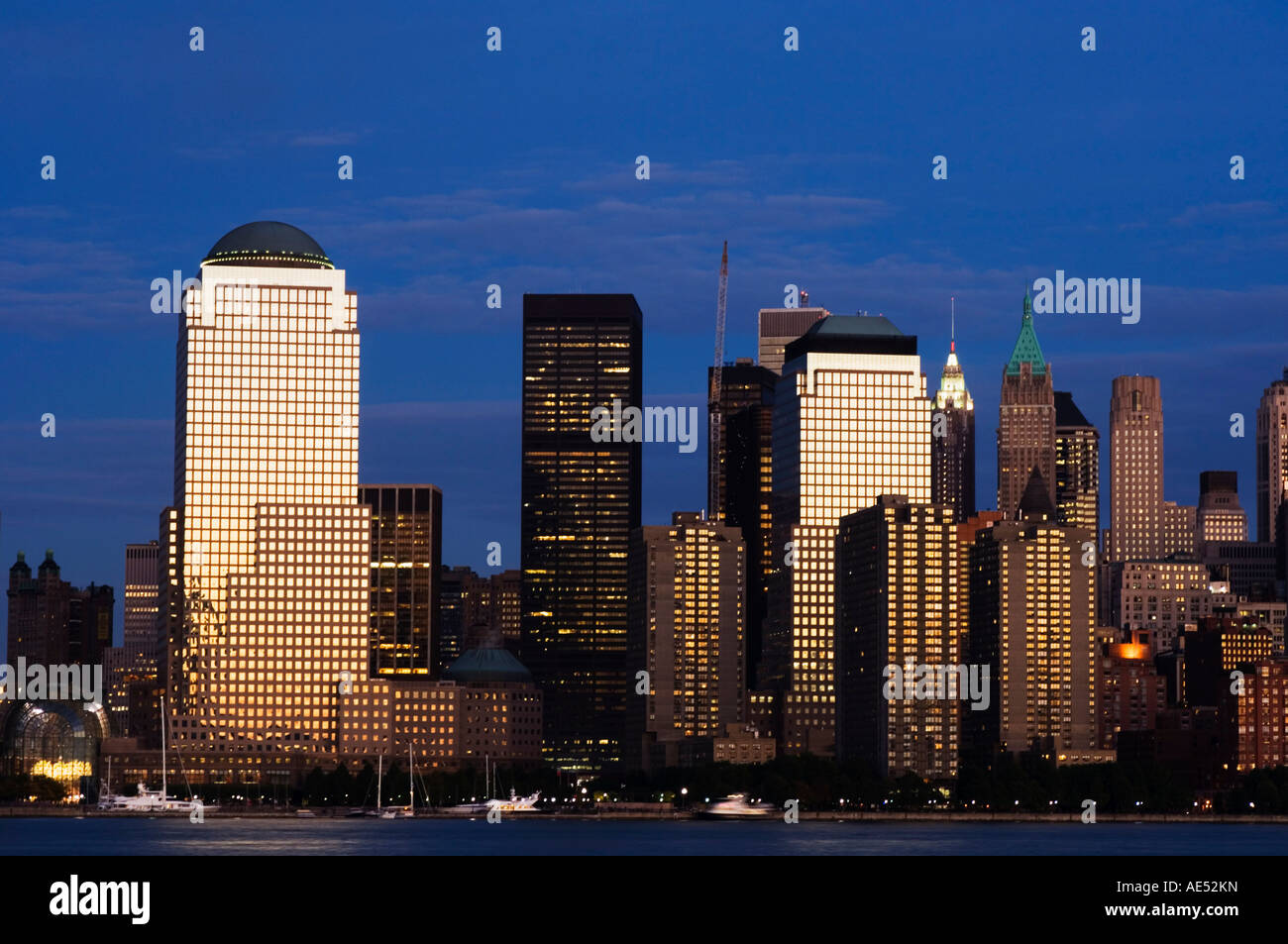 Lower Manhattan skyline at dusk across the Hudson River, New York City ...