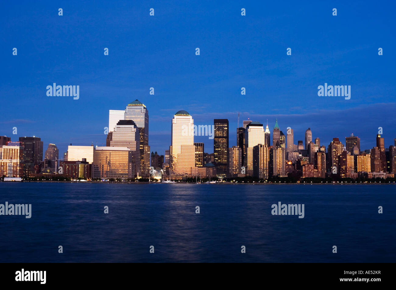 Lower Manhattan skyline at dusk across the Hudson River, New York City ...