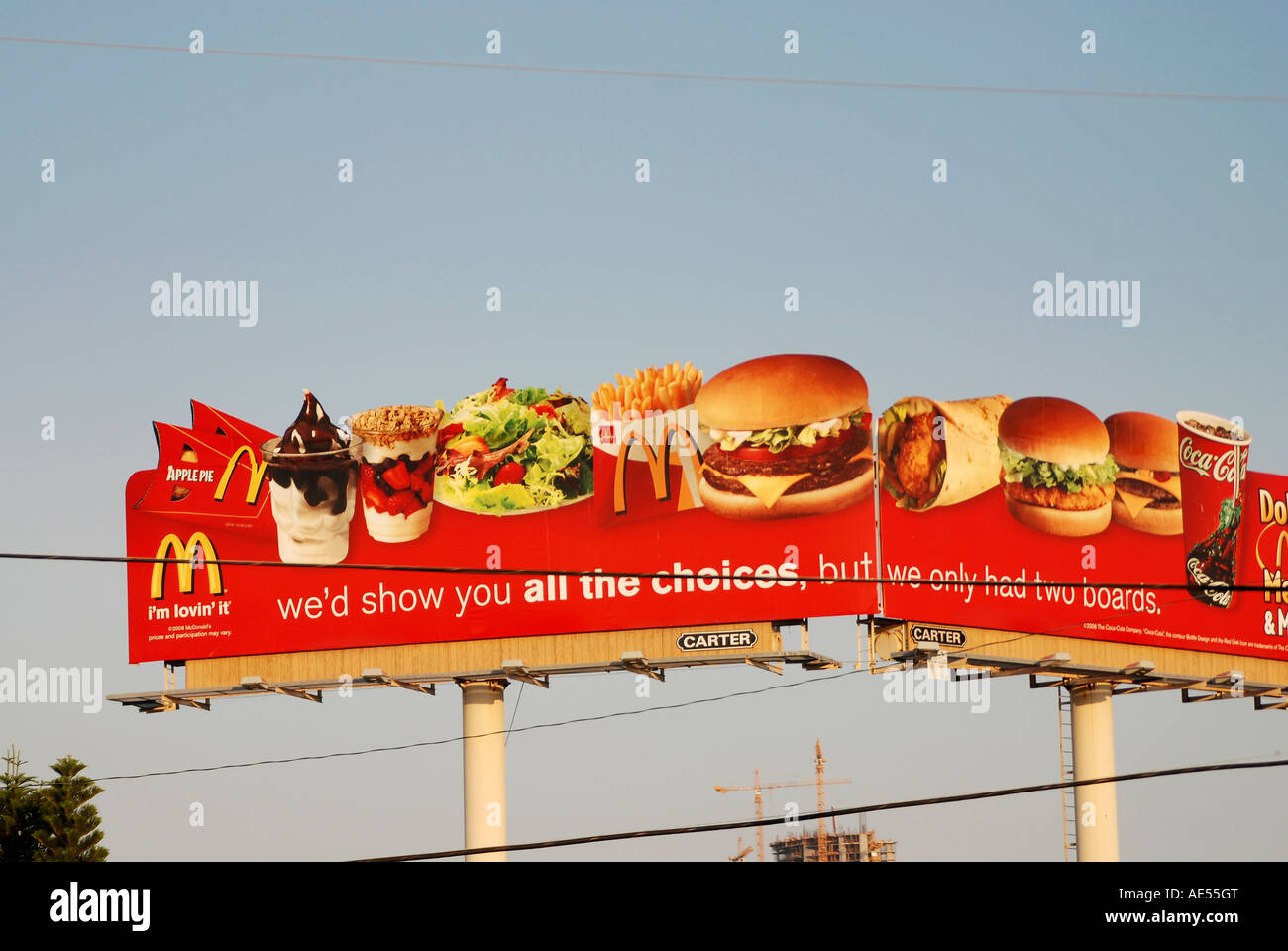 Two large red McDonald s Billboards showing burgers and fries with ...