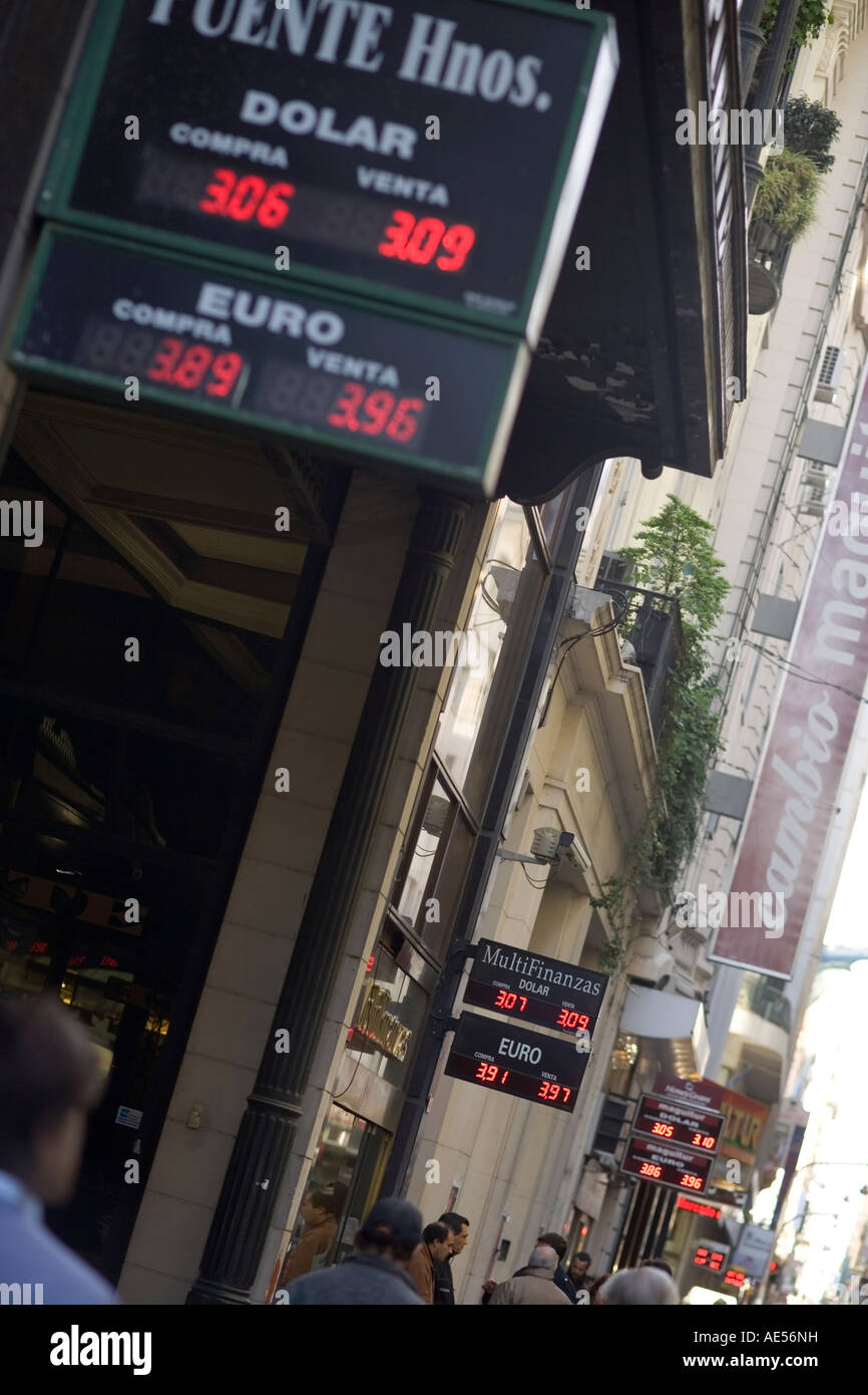 Dollar Euro Peso bank exchange rates displayed in a Buenos Aires street in the financial district. Stock Photo