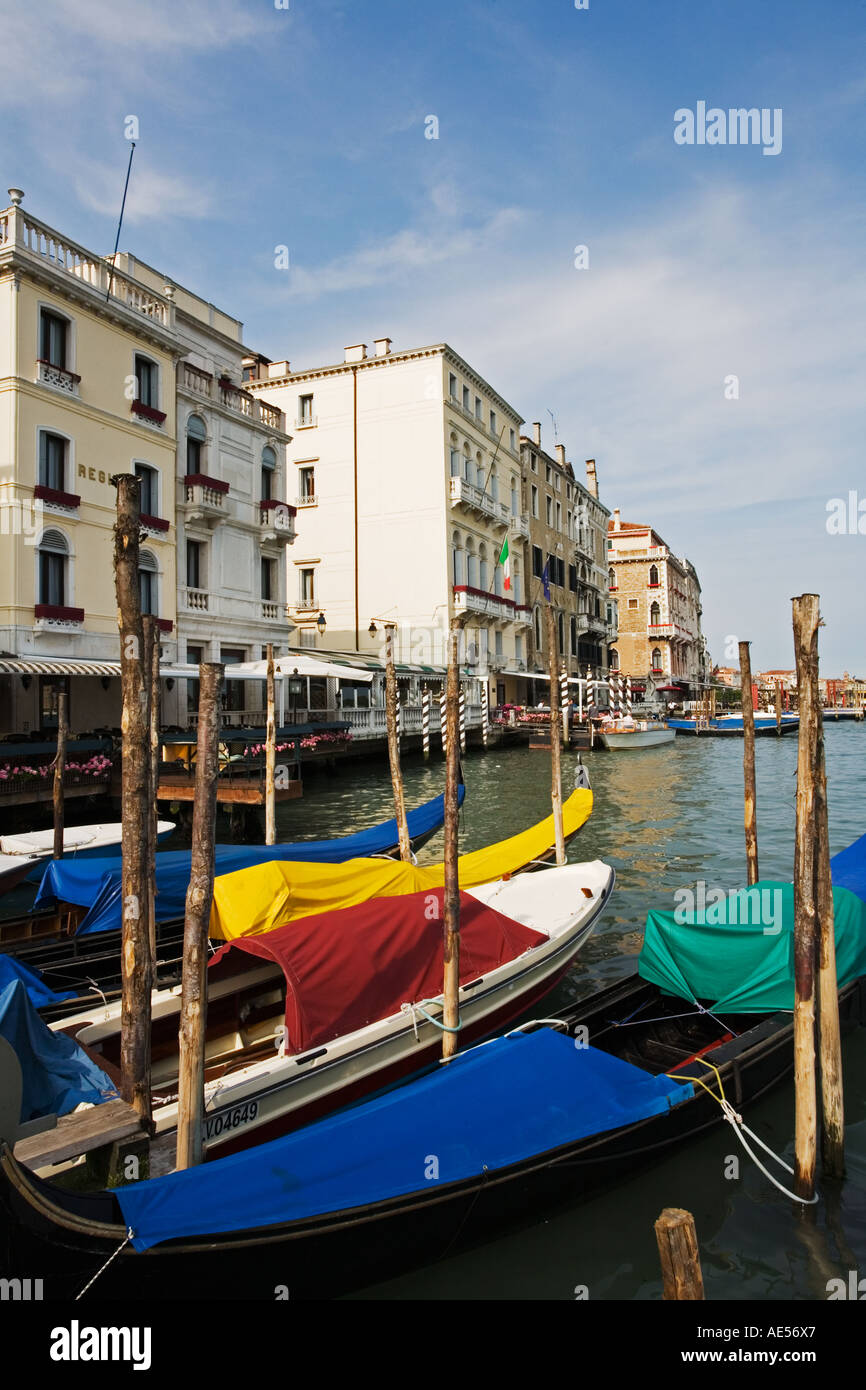 Gondolas along the Grand Canal with typical Venusian architecture in Venice Italy Stock Photo