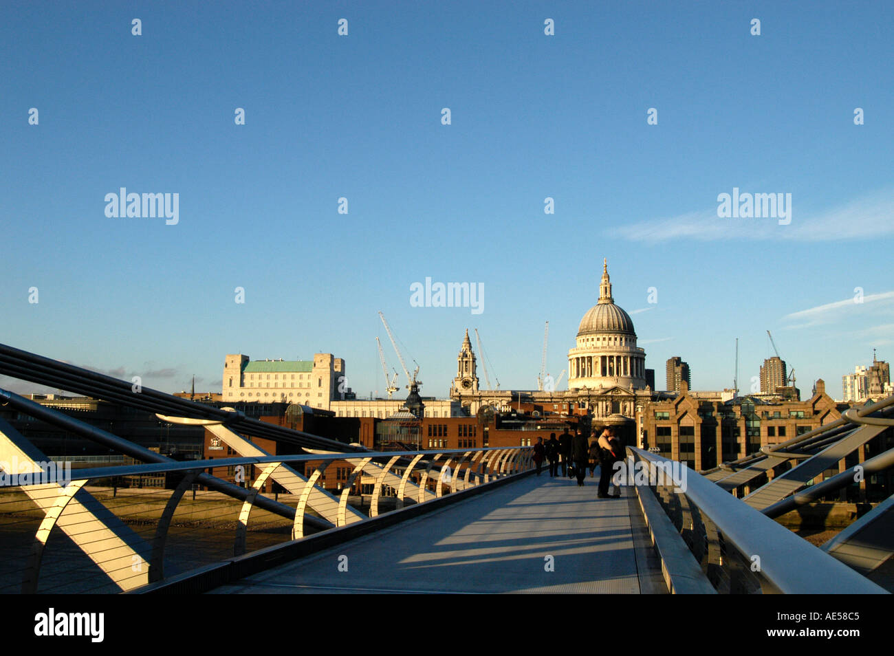 Millennium Bridge over River Thames and St Paul's Cathedral, London England UK Stock Photo