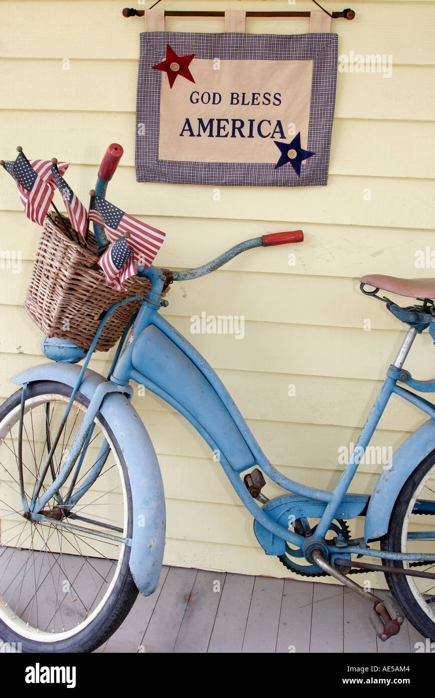 Virginia Loudoun County,Hamilton,porch,bicycle,bicycling,riding,biking,rider,bike,banner,God Bless America,flag,VA060521057 Stock Photo