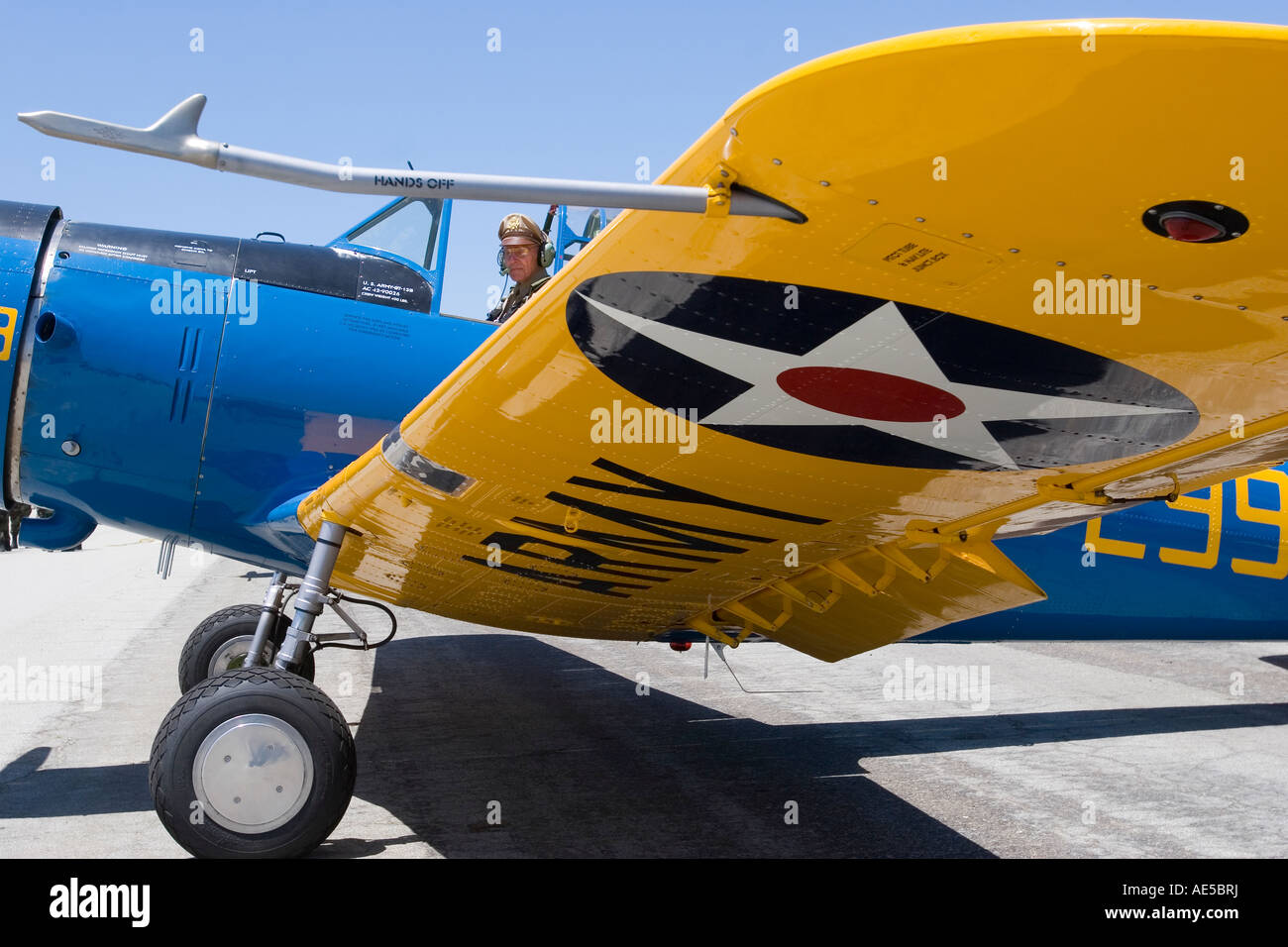 Pilot sitting in cockpit of army Vultee BT 13 Valiant as seen from ...