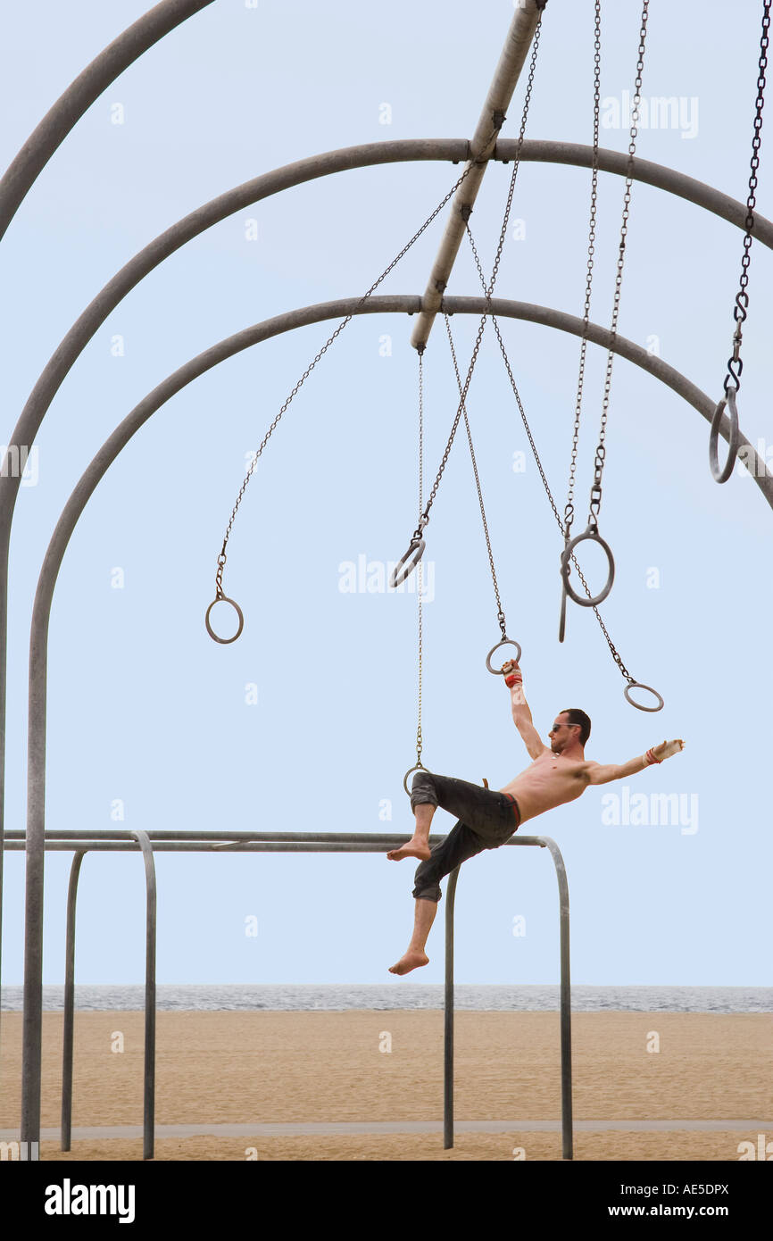 Gymnast swinging from rings hi-res stock photography and images - Alamy