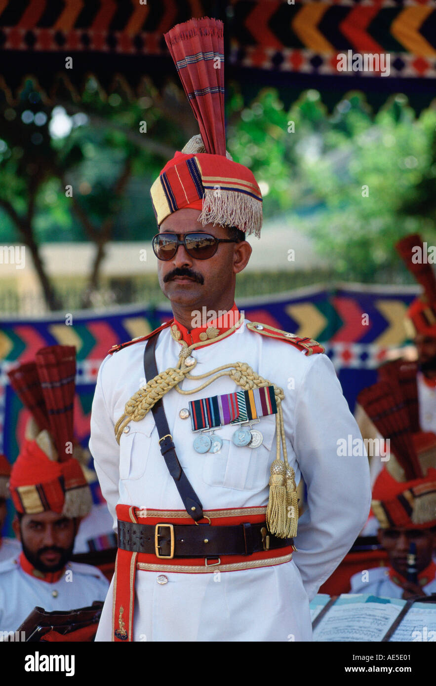 Military man with medals standing at ease watching a parade in Pakistan Stock Photo