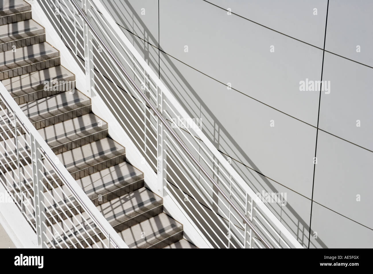 Architecture of white staircase with shadows curving around San Jose City Hall building Stock
