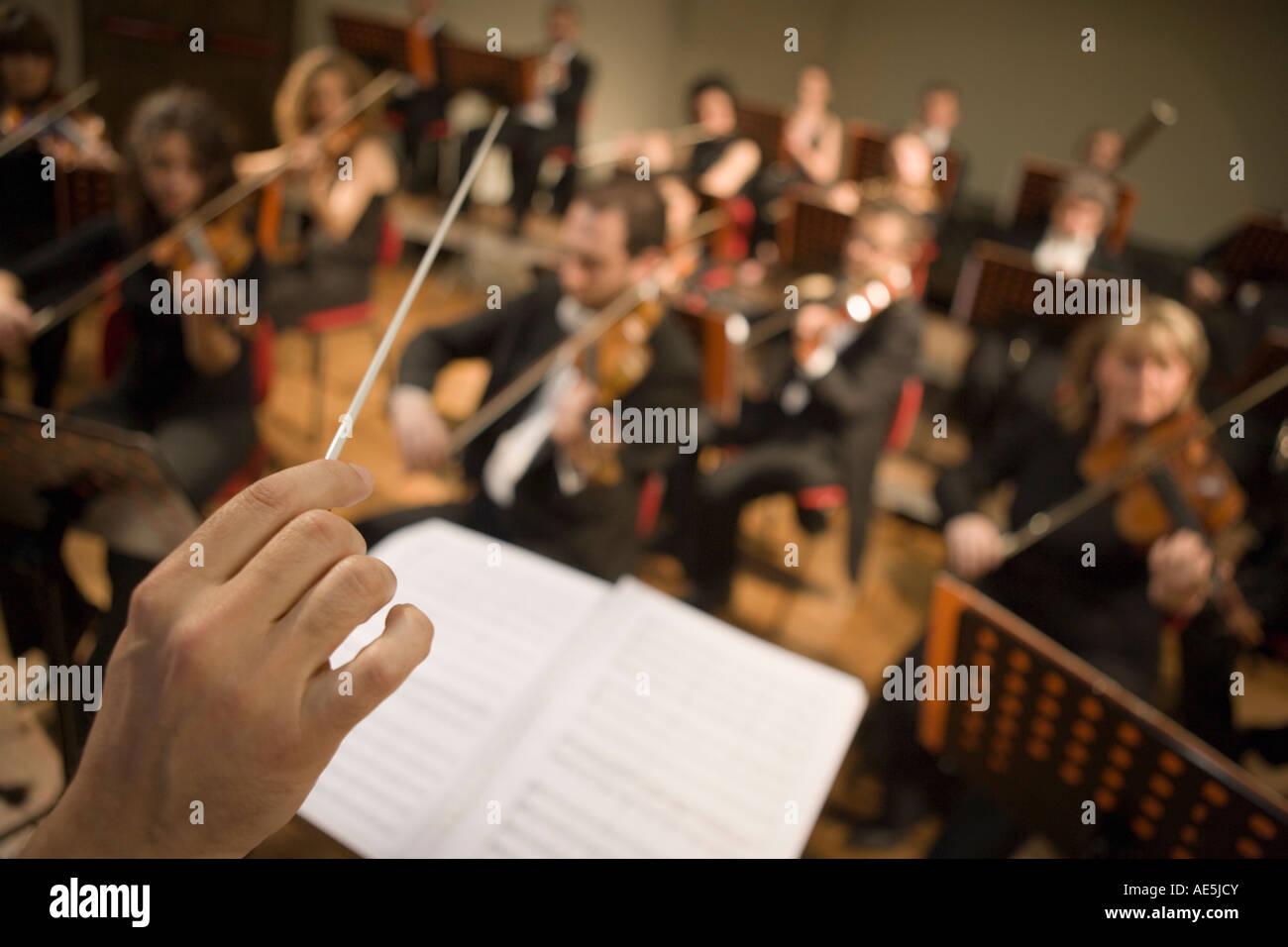Director Directing the Classic Music Orchestra Stock Photo