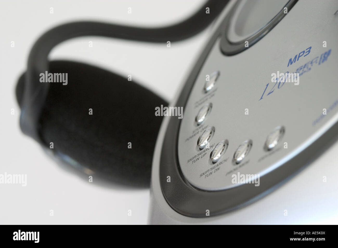 Hi tech chrome MP3 player with curved headset Stock Photo Alamy