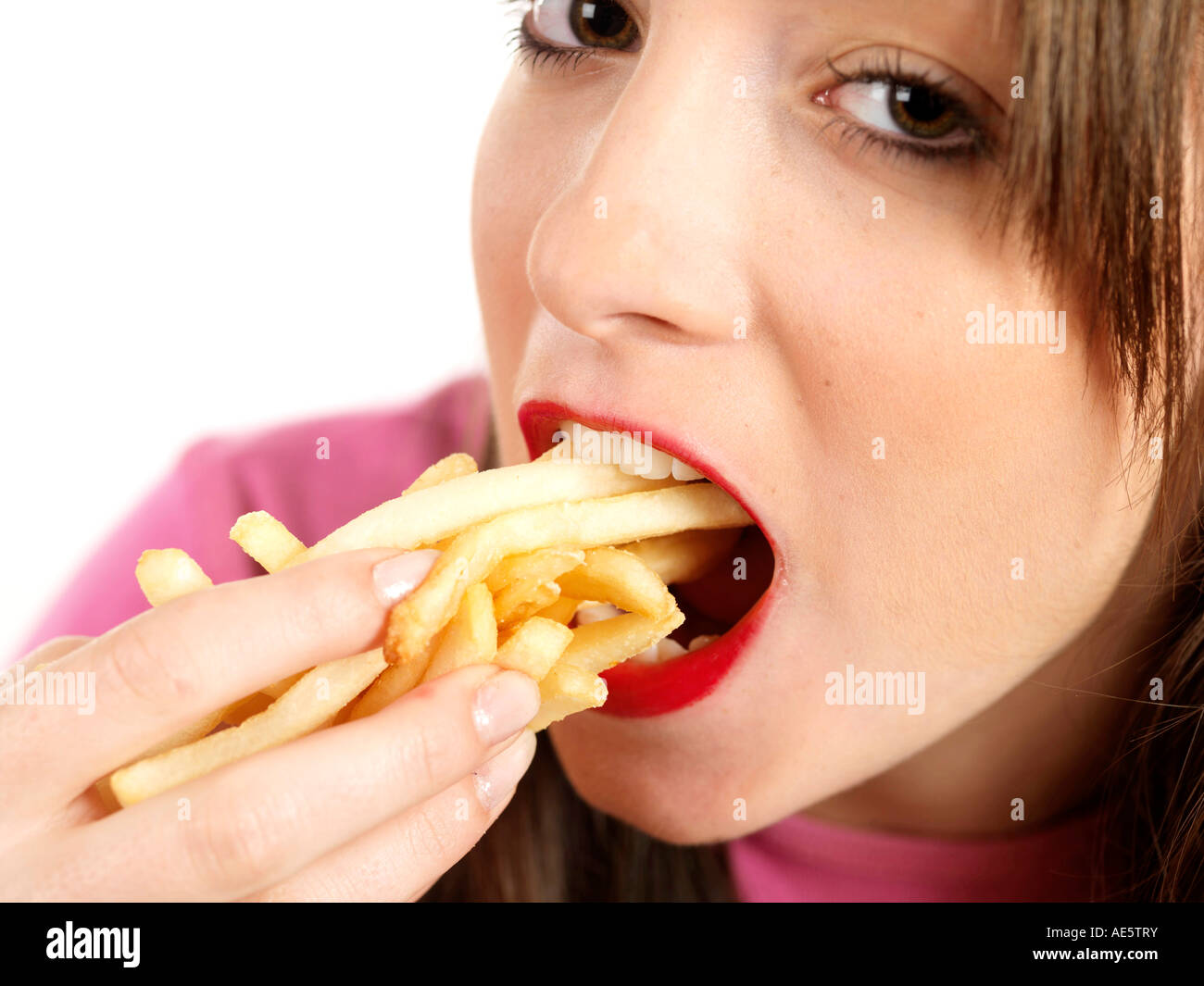 Teenage Girl Eating Chips Model Released Stock Photo