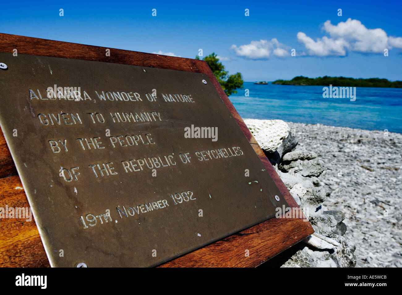 Sign marking Aldabra as a world heritage site Aldabra Island Seychelles Stock Photo