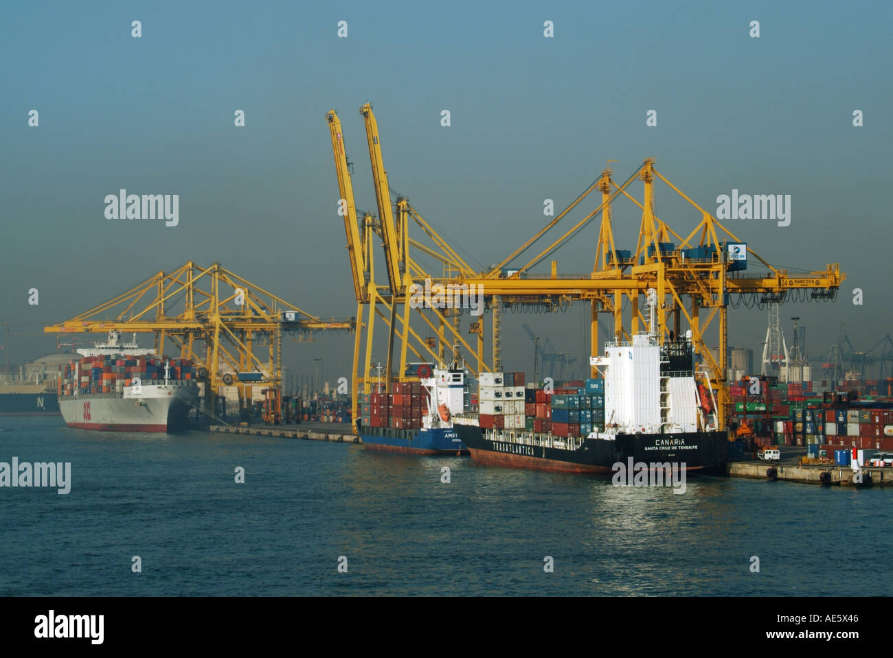 Barcelona port general view of shipping with dockside cranes and containers Stock Photo
