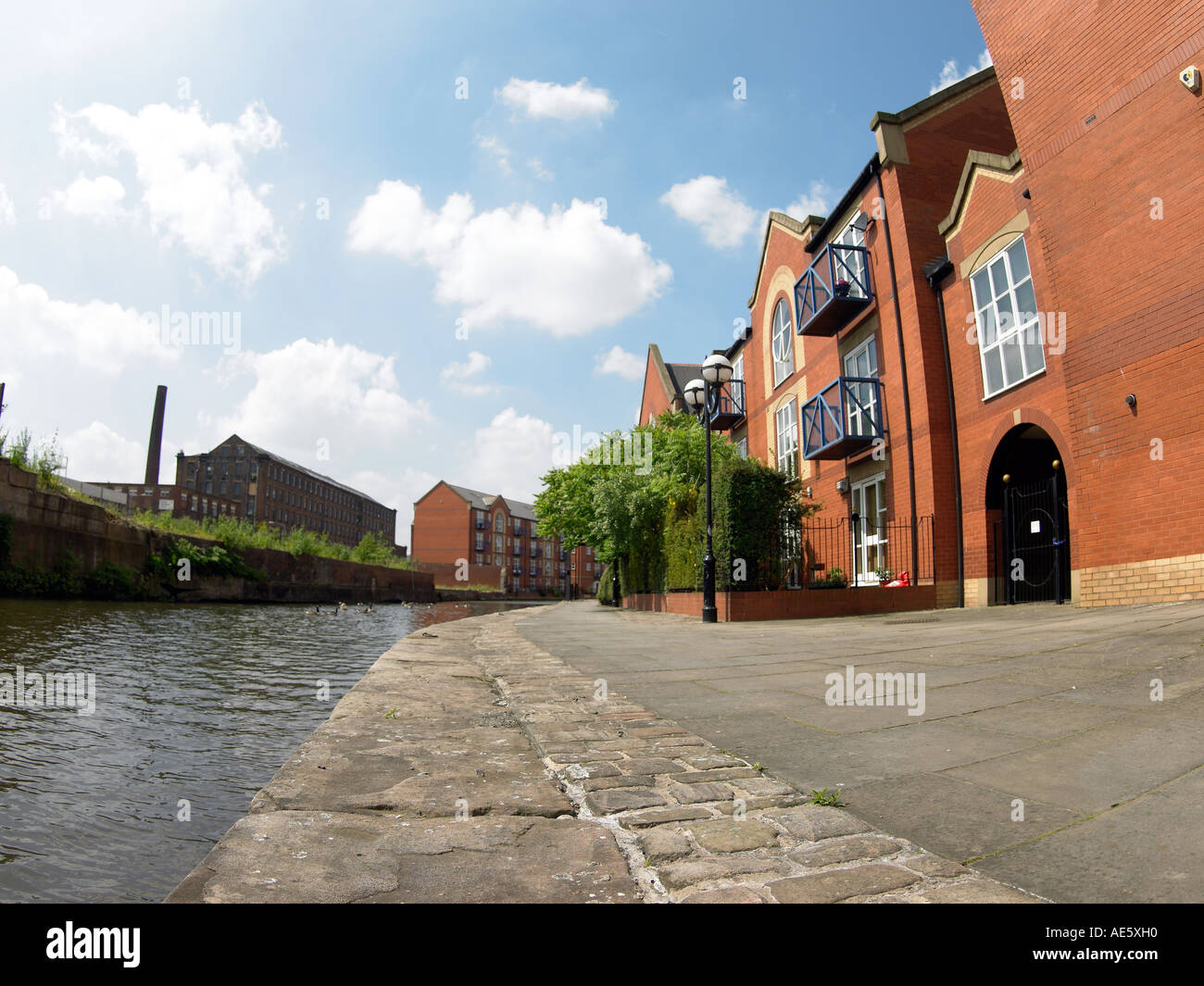 Housing and canal Piccadilly Village Manchester England Stock Photo Alamy