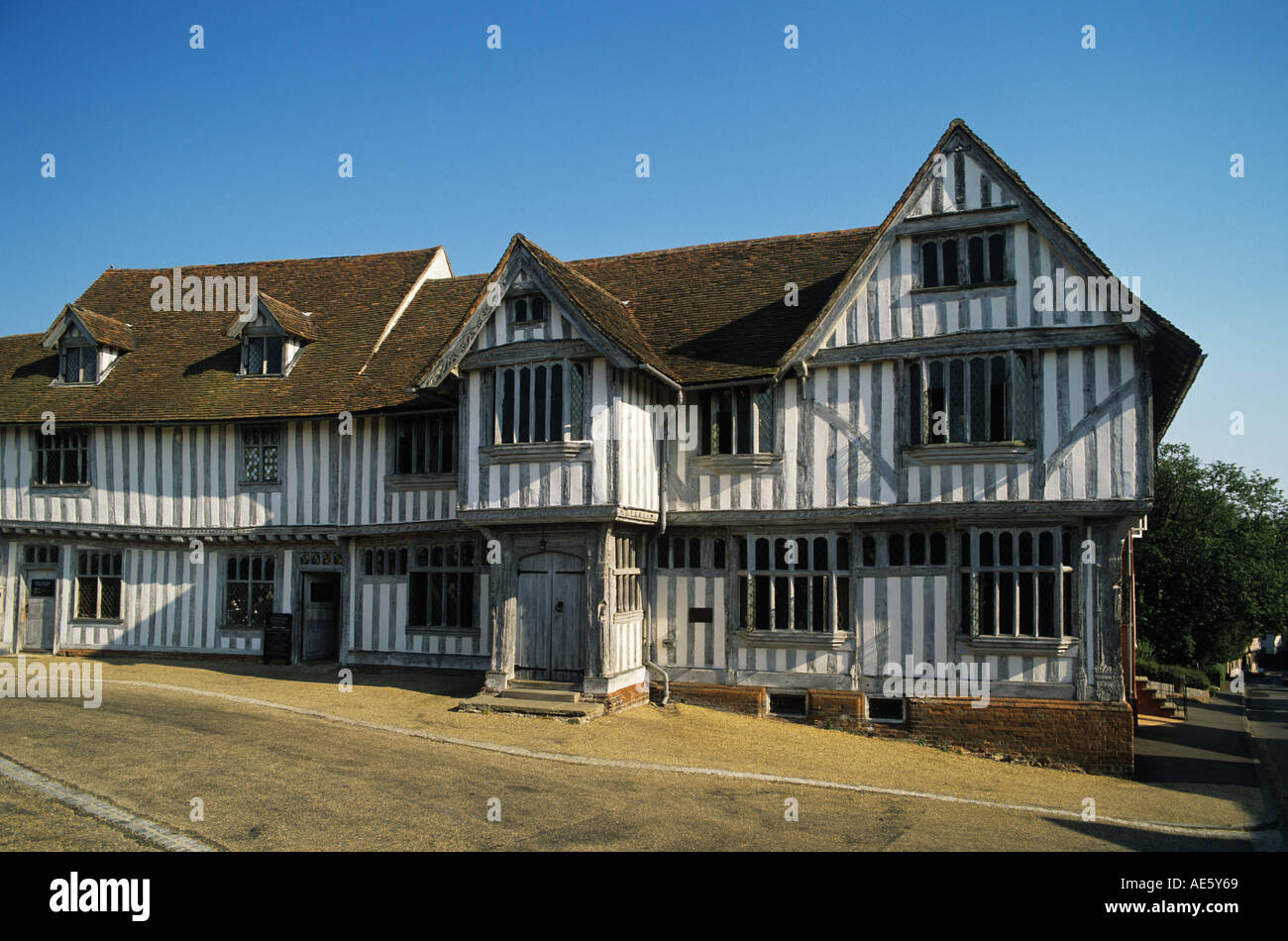 Timber frame building dating from 1529 Traditional Lime wash carved windows doors and corner structural timbers Suffolk Stock Photo