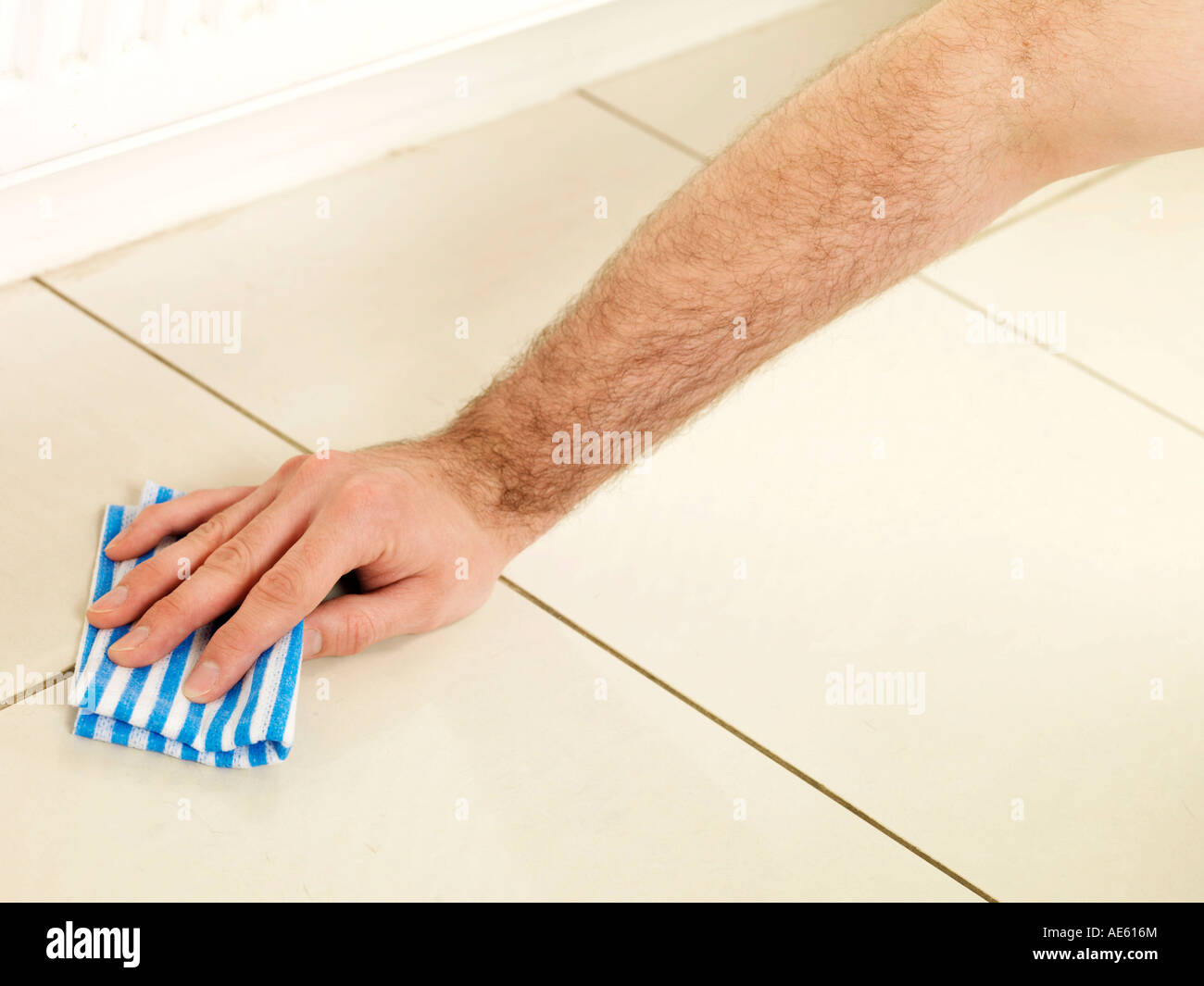 Man wiping surface clean cleaning floor hires stock photography and