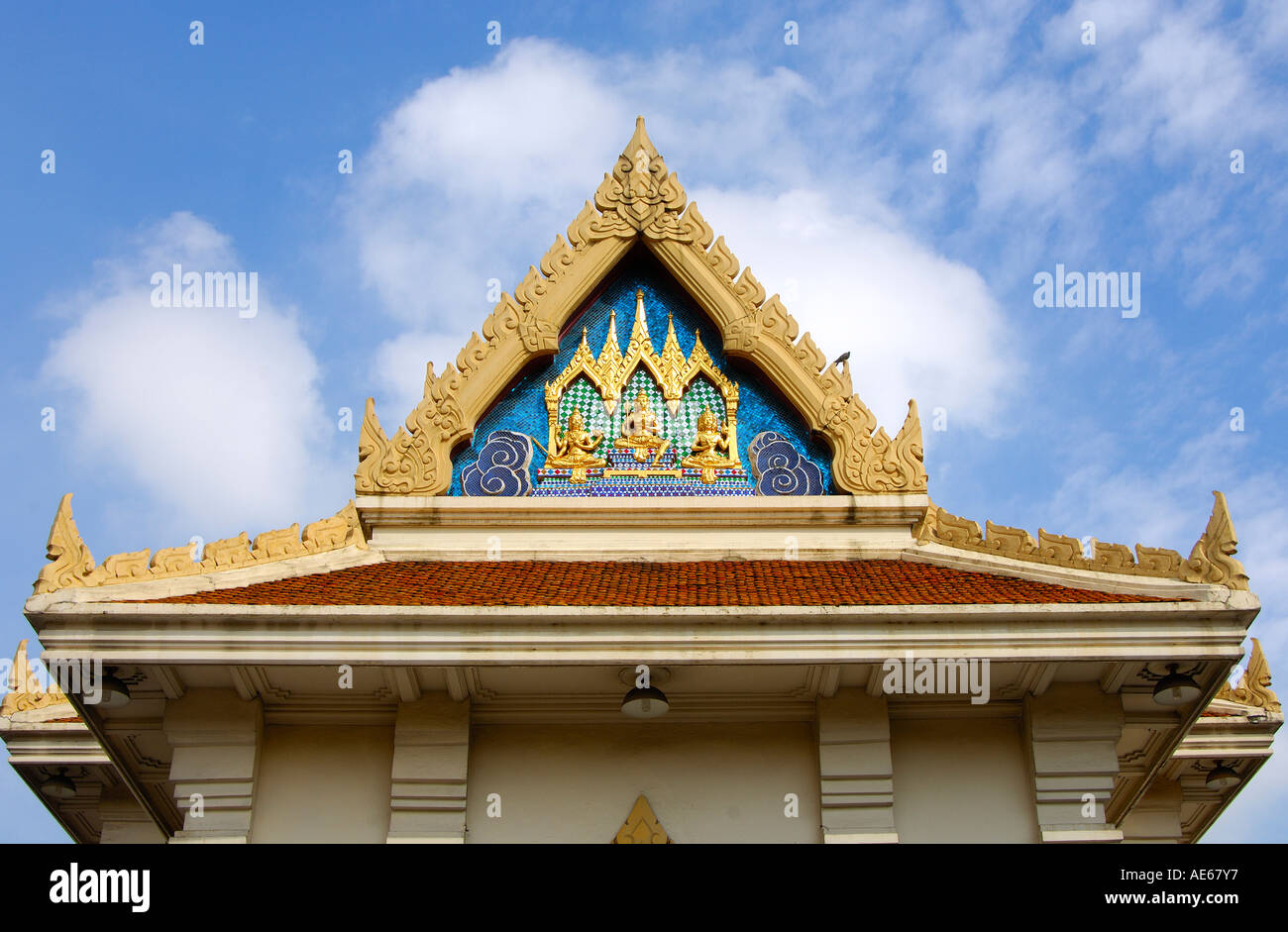 Decorated gable of a buddhist temple Wat Trimitr Temple Bangkok Thailand Stock Photo