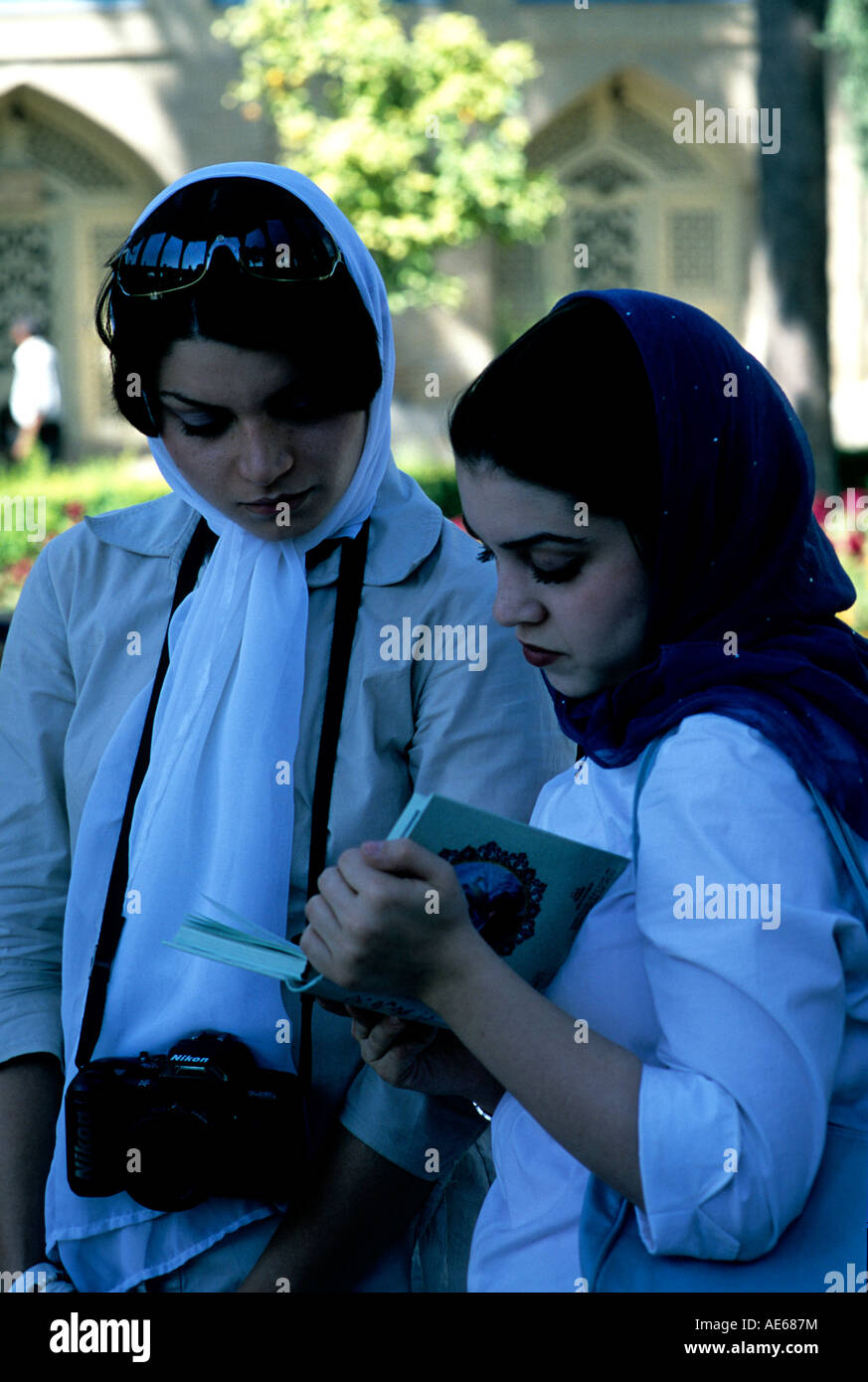 Iran: two young Iranian women visiting the tomb of Hafez, in Shiraz Stock Photo
