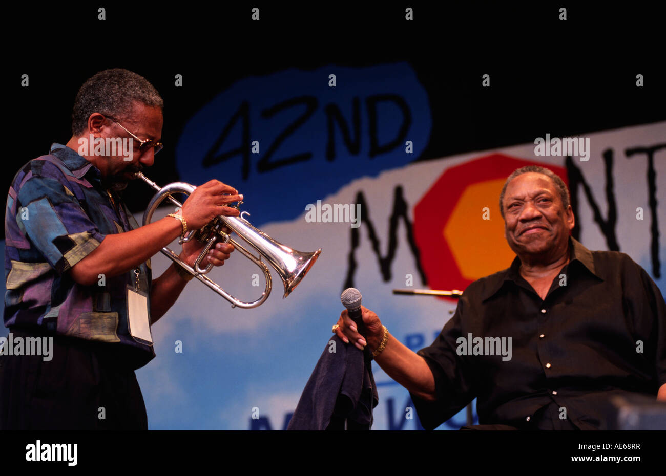 JOSEPH HARDIN JUNIOR plays the TRUMPET in front of BOBBY BLUE