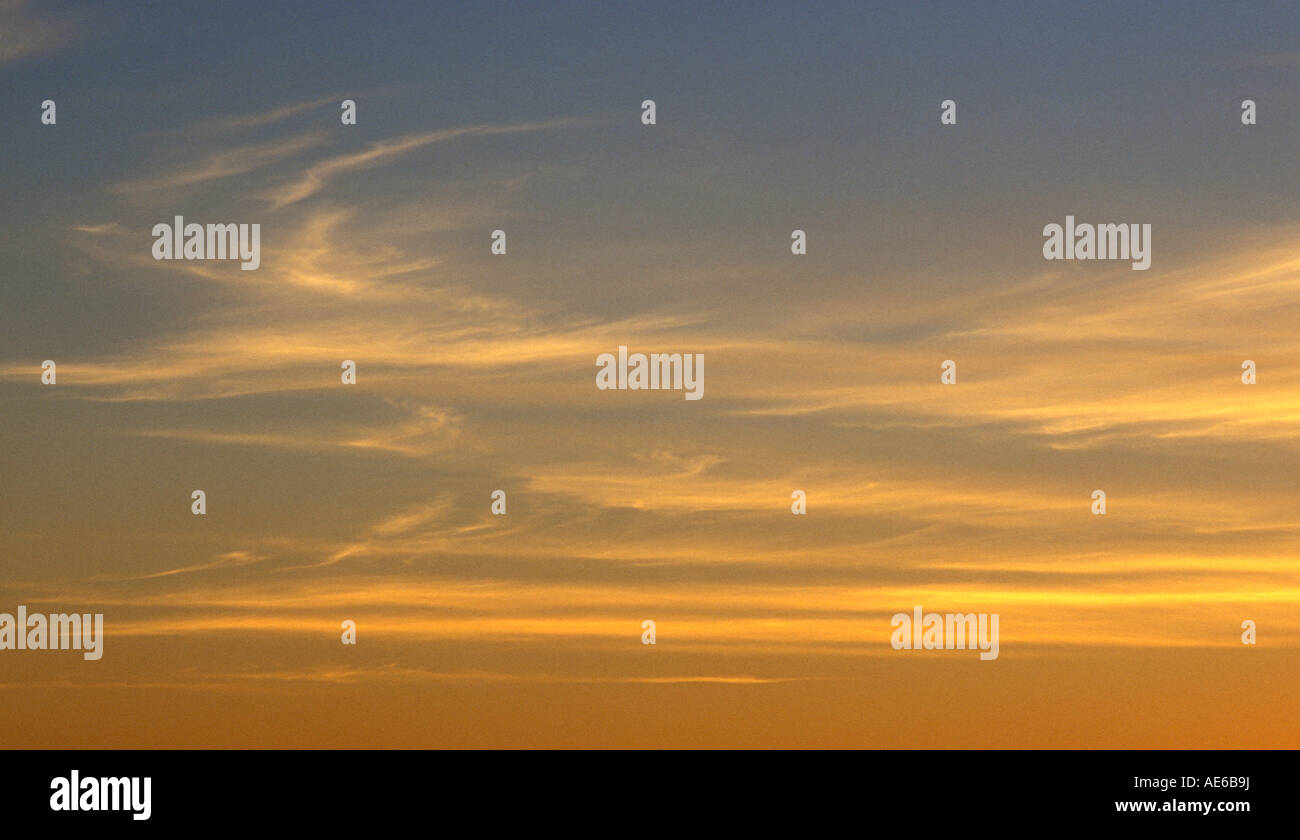 Wispy sunset clouds Stock Photo