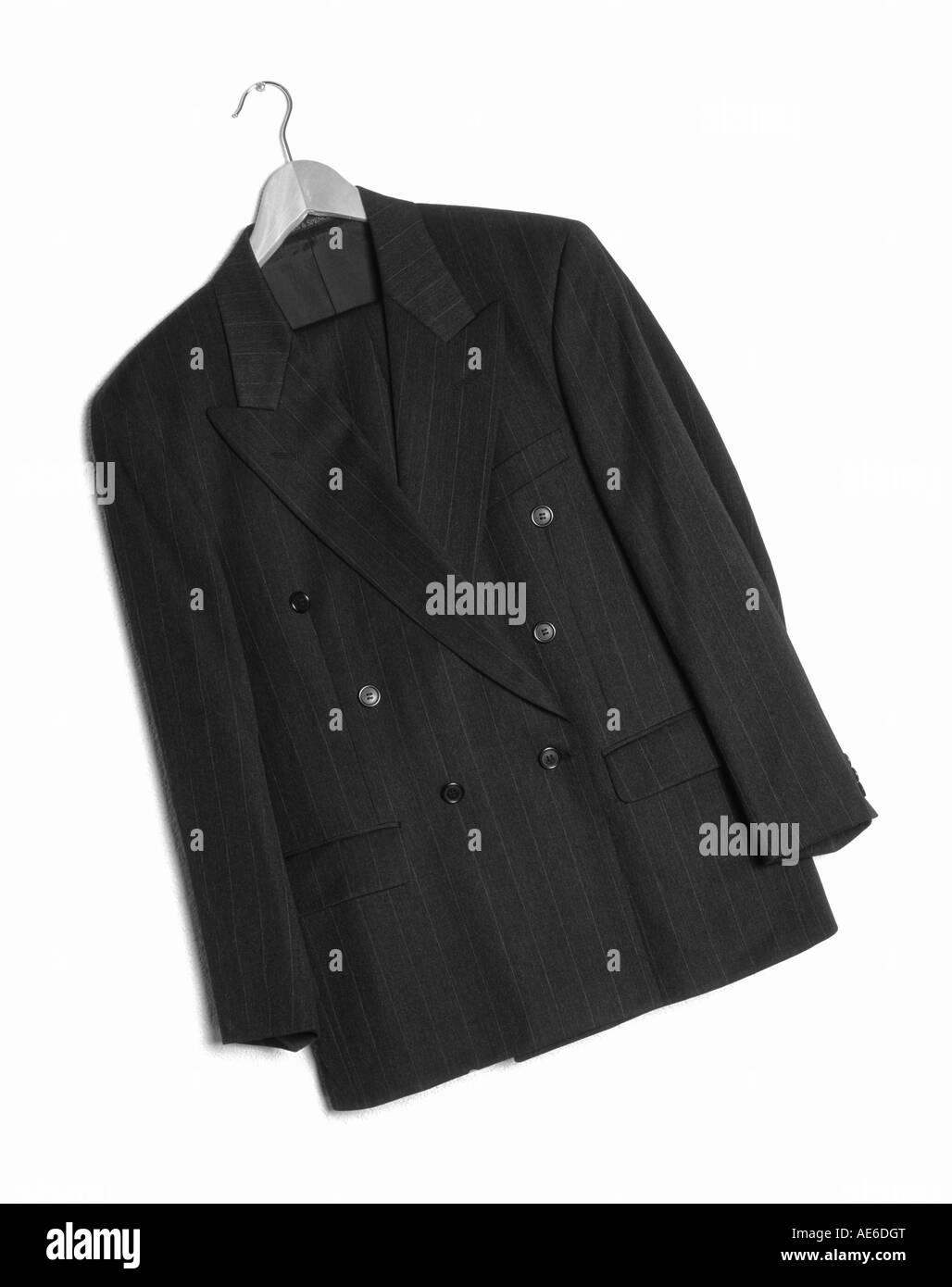 Pinstripe suit hanging up on a white background Stock Photo