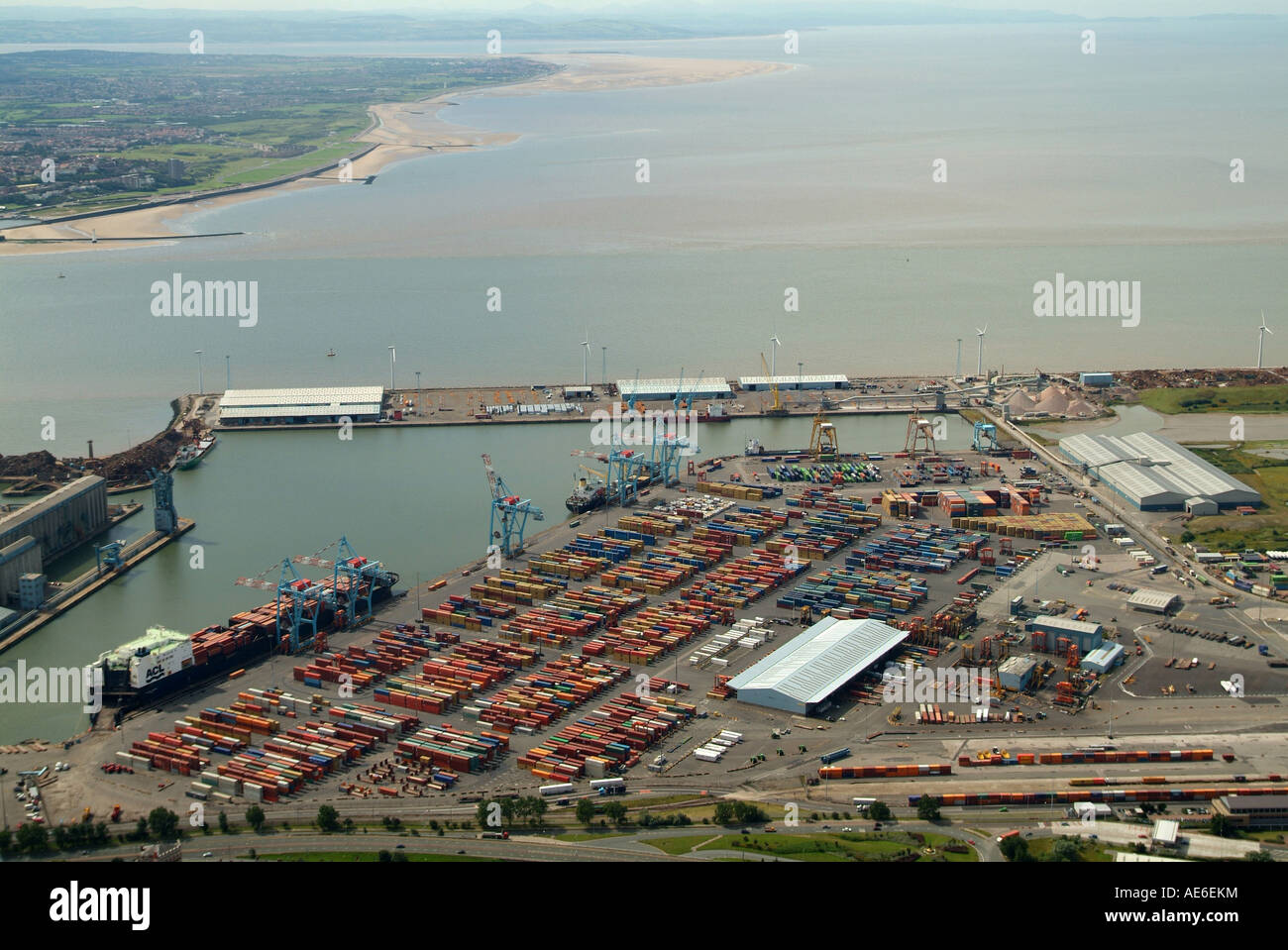 Liverpool Docks, Bootle, Merseyside, North West England, aerial view and the mouth of the Mersey behind Stock Photo