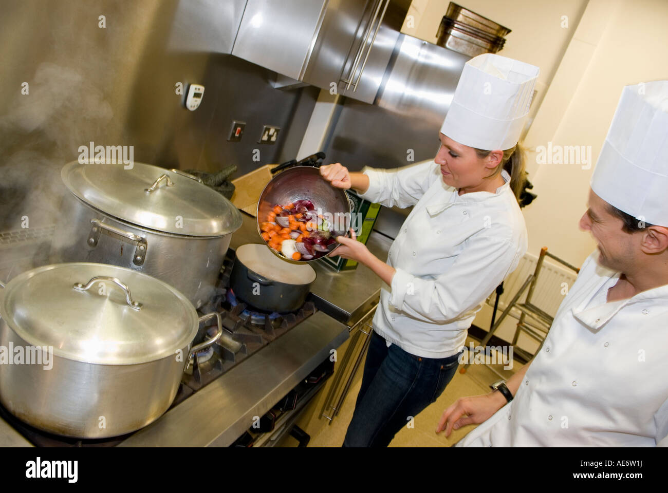 Students take part in a cookery school in the City of London February ...