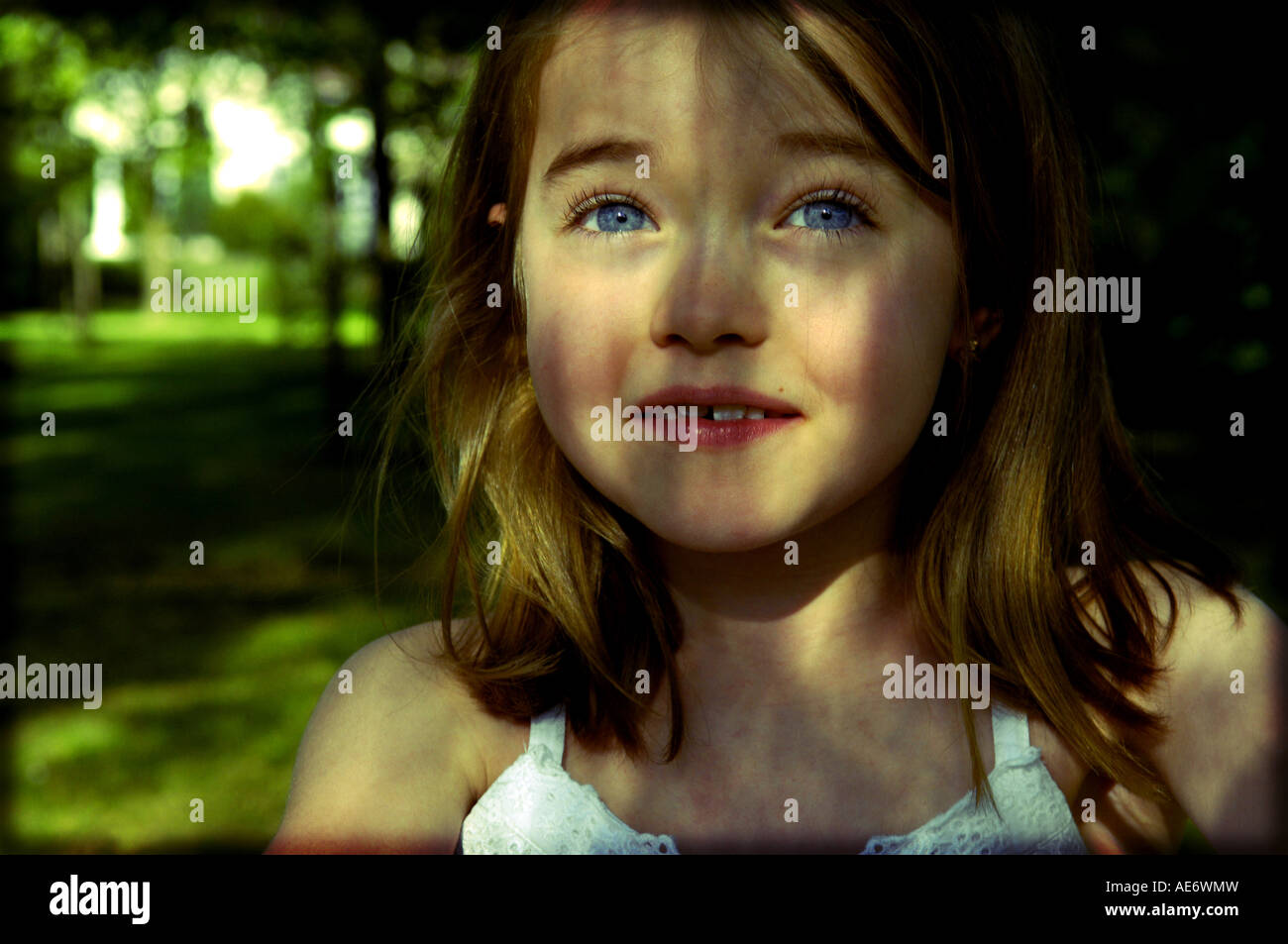 portrait head and shoulders girl child six seven happy positive colour