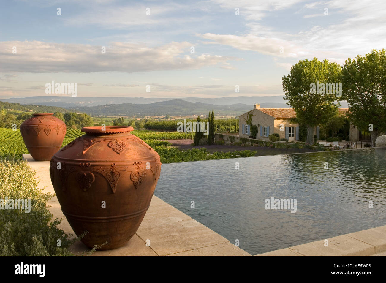 Swimming pool and poolside urns of a villa in Provence Stock Photo