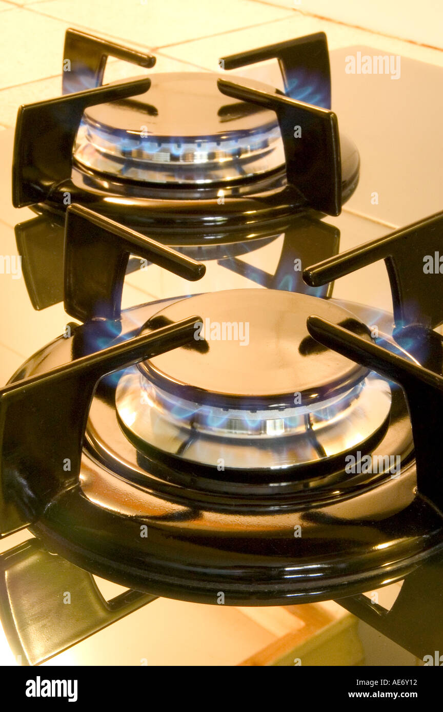 Burning domestic gas cooker rings hires stock photography and images