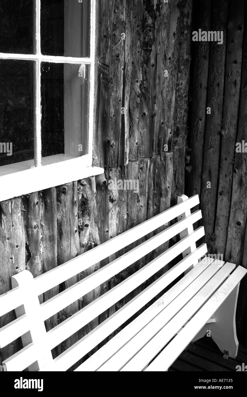 Wooden Lodge And Bench Stock Photo Alamy