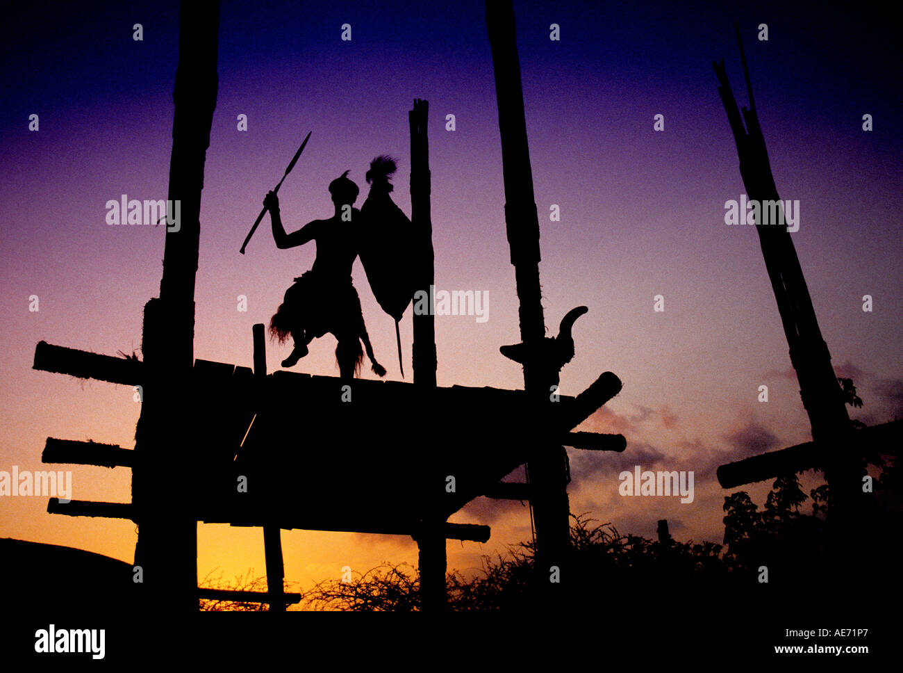 Zulu warrior on guard tower at Shakaland in KwaZulu Natal, South Africa Stock Photo