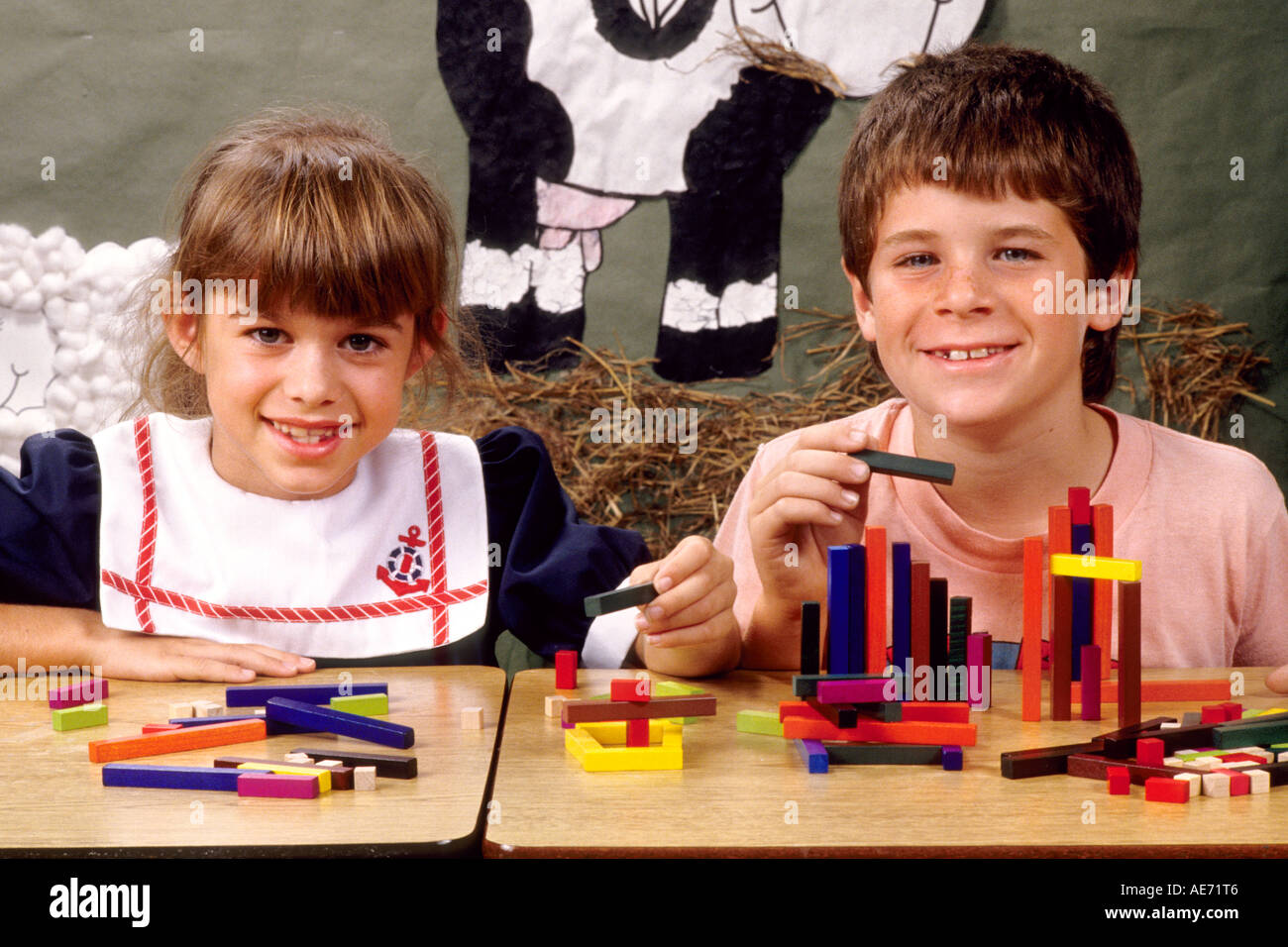 Students in first grade working together on block assignment in school Stock Photo