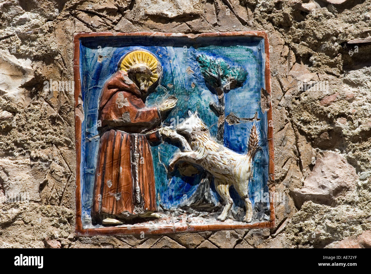 ITALY ASSISI UMBRIA TILE ON WALL IN ASSISI ST FRANCIS BASILICA SAN FRANCESCO Stock Photo