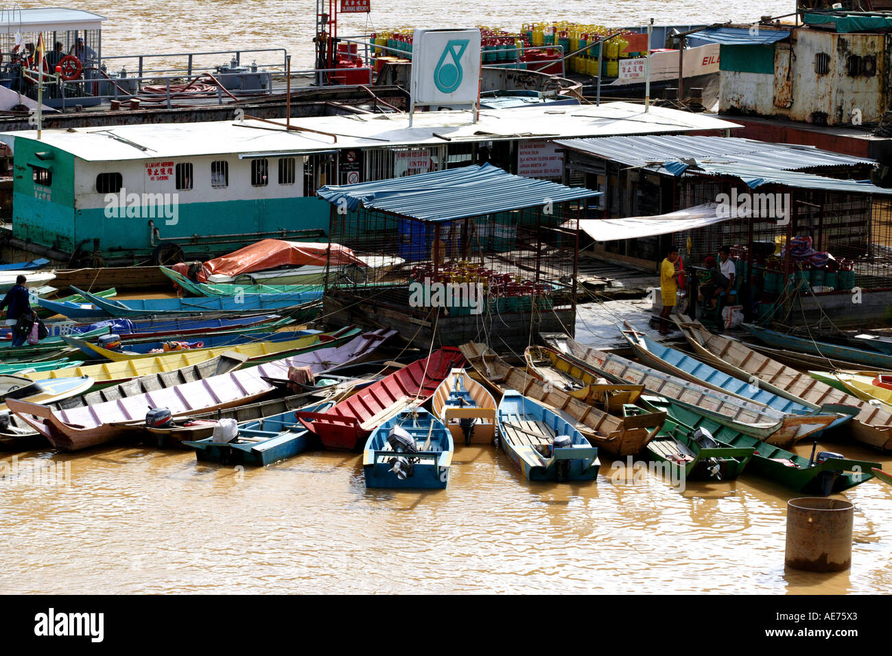 Boat Refueling Station in the Waters of the Batang Rajang River, Kapit, Sarawak, Borneo, Malaysia Stock Photo