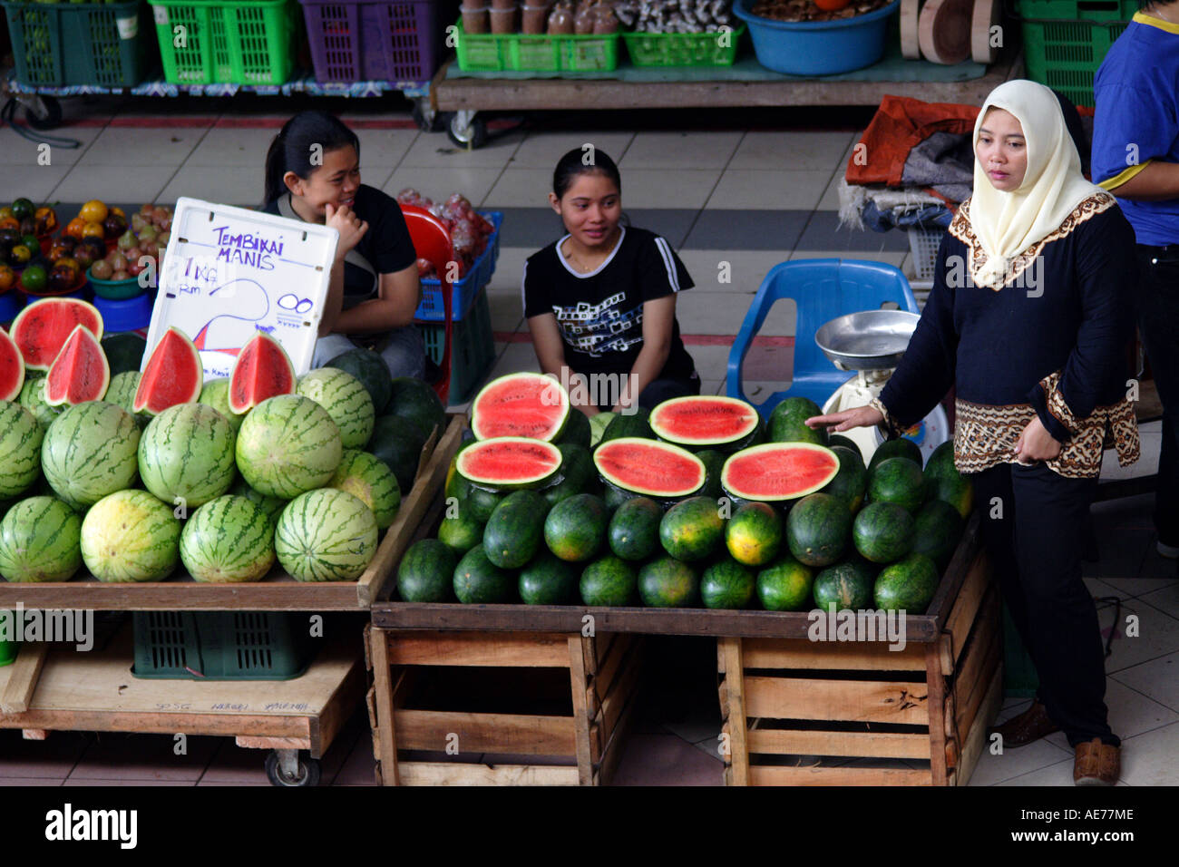 Muslim Woman Selling Watermelons at the Big Sibu Lembangan or Native Market,  Sibu, Sarawak, Borneo, Malaysia Stock Photo - Alamy