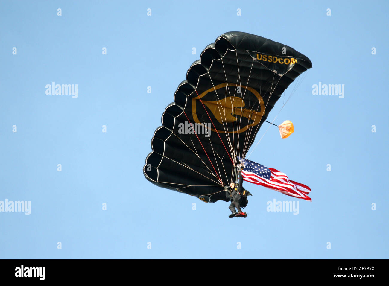 United States Military SOCOM Parachutist with American Flag at MacDill Air Fest in Tampa Florida USA Stock Photo
