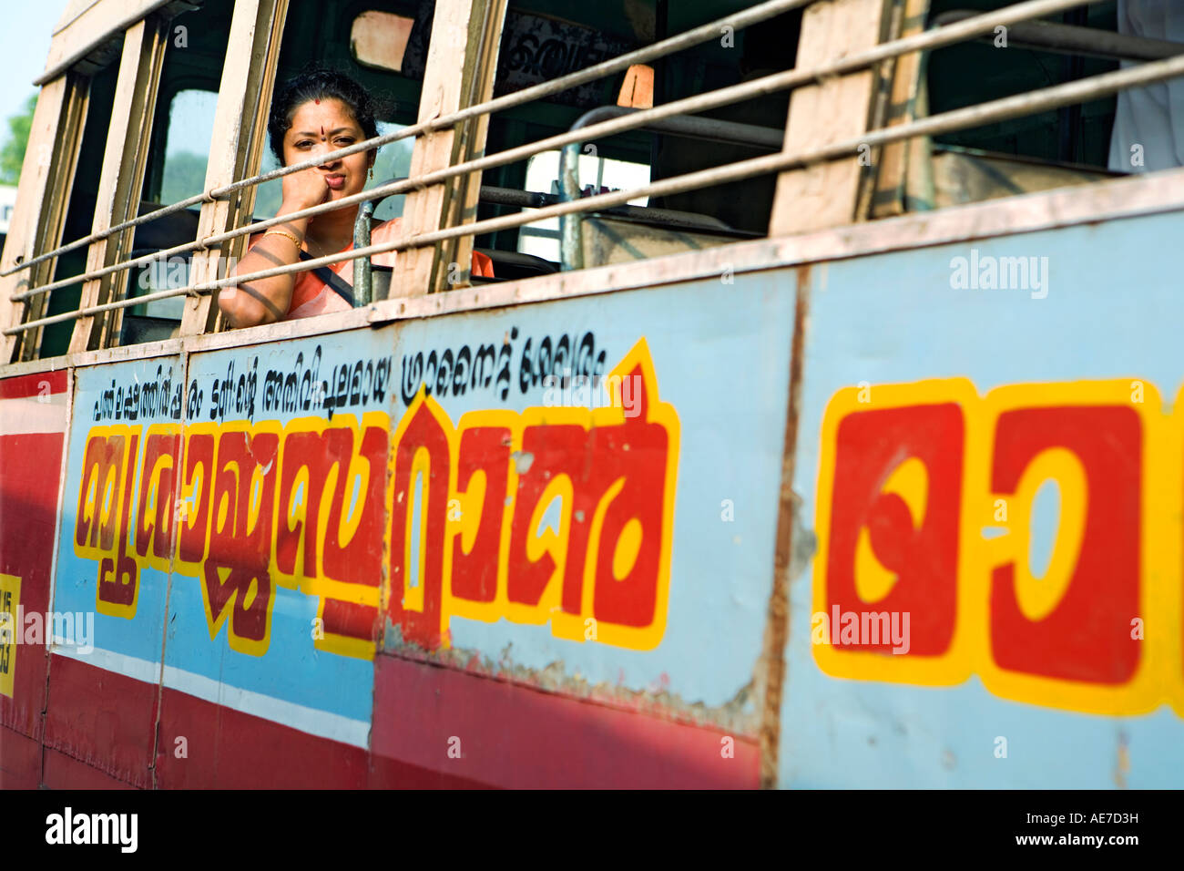 INDIA KERALA ALLEPPEY AN INDIAN LADY ON BUS NEAR KERALAN BACKWATERS Stock Photo