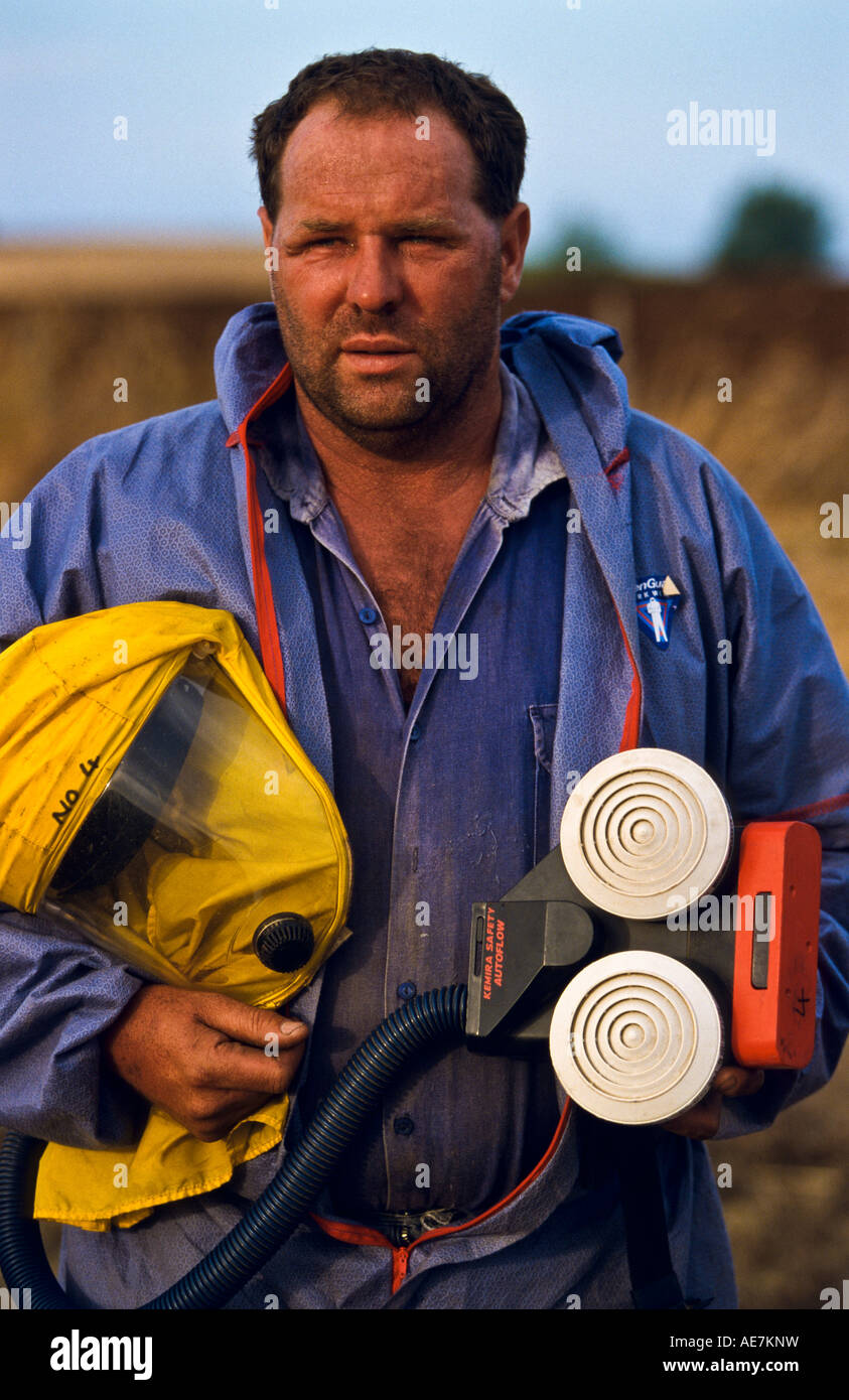 Worker in protective clothing Tasmania, Australia Stock Photo