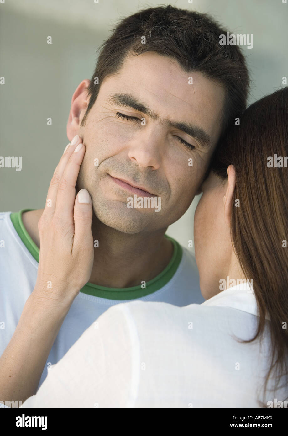 Couple Woman Touching Man S Cheek Stock Photo Alamy
