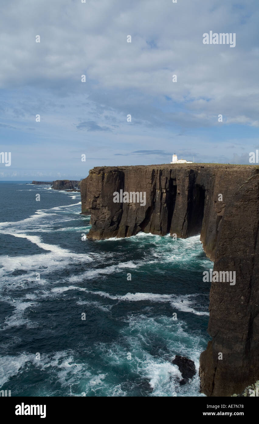 dh South Head of Caldersgeo ESHA NESS SHETLAND Volcanic rock seacliffs and Eshaness lighthouse cliffs sea coast northern isles Stock Photo