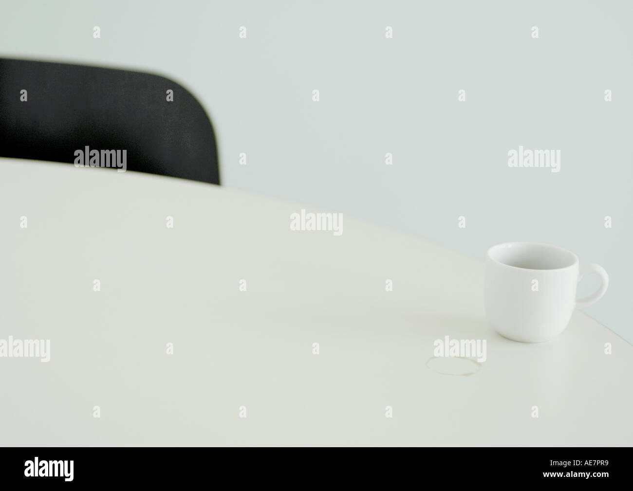 Coffee cup and coffee ring on table Stock Photo