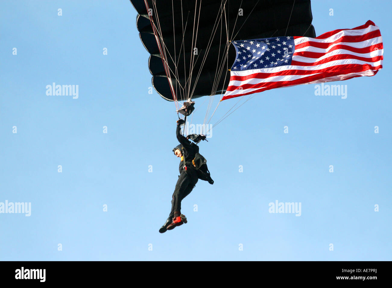 United States Military SOCOM Parachutist with American Flag at MacDill Air Fest in Tampa Florida USA Stock Photo