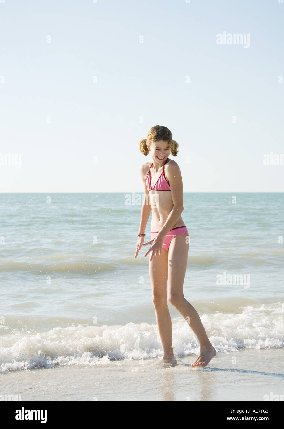 Preteen girl in bikini standing hi-res stock photography and images - Alamy