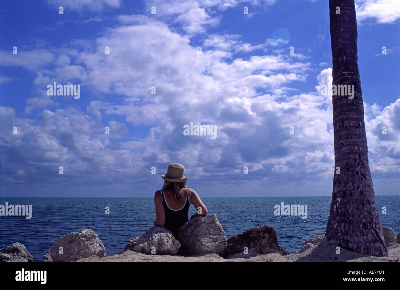 Girl on shore in straw hat hi-res stock photography and images - Alamy